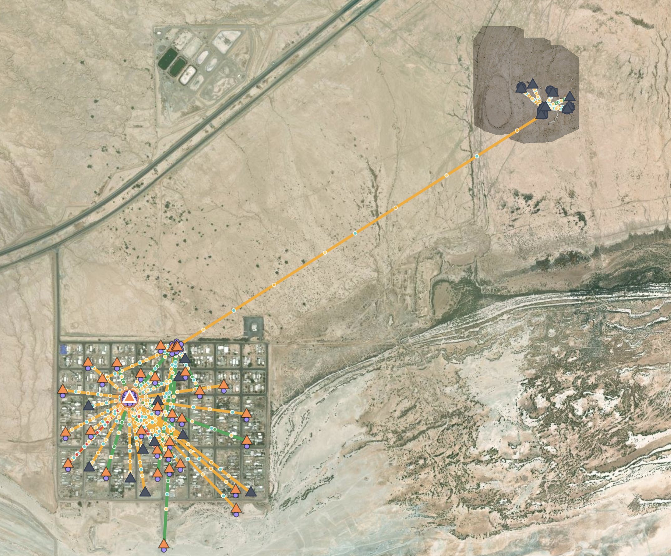 Satellite map of an off-grid desert community with radio links radiating from access points